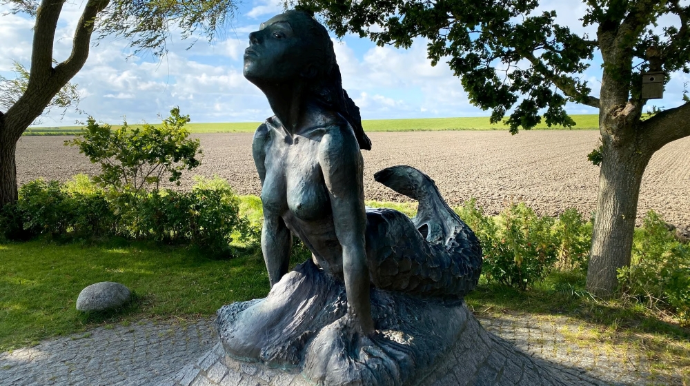 Mystisches Seeweibchen am Strand